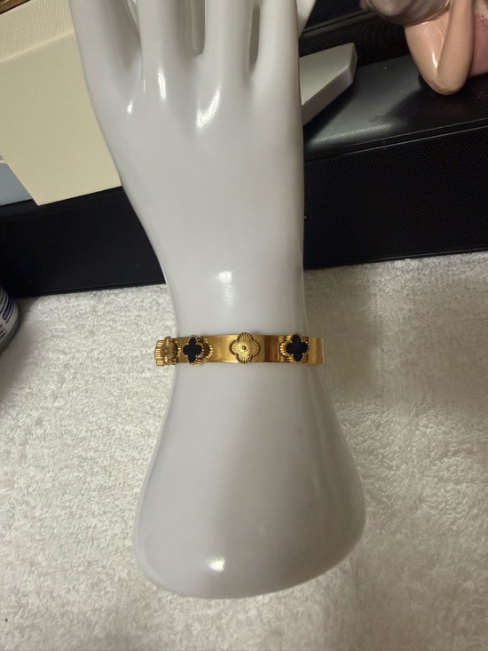 Bose Jewelry - Bose Gold-Tone Bangle with Black Clover Accents